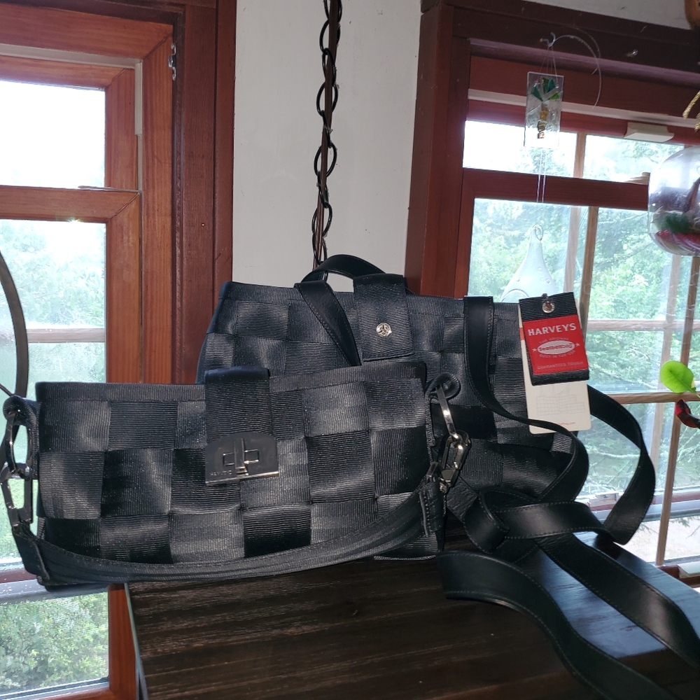 Two old school mercedes black Harveys.